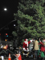 Santa pulls lever for Christmas tree lighting in Citrus Heights. Photo by Luke Otterstad