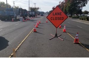 lane closed road sign