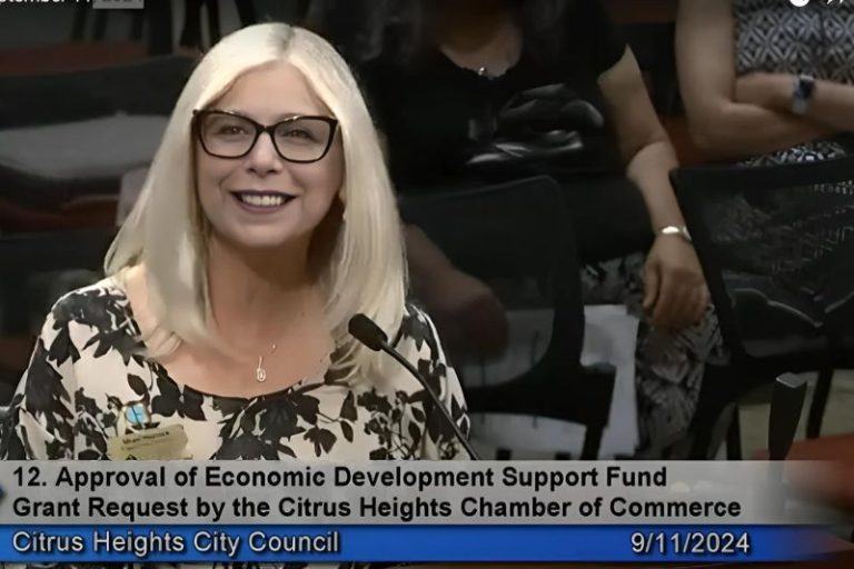 Sheri Merrick speaks at a city council meeting