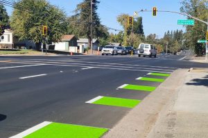 San Juan Avenue facing the intersection of Chesline Drive (to the left) and Willowcreek Drive (to the right). // SB Williams