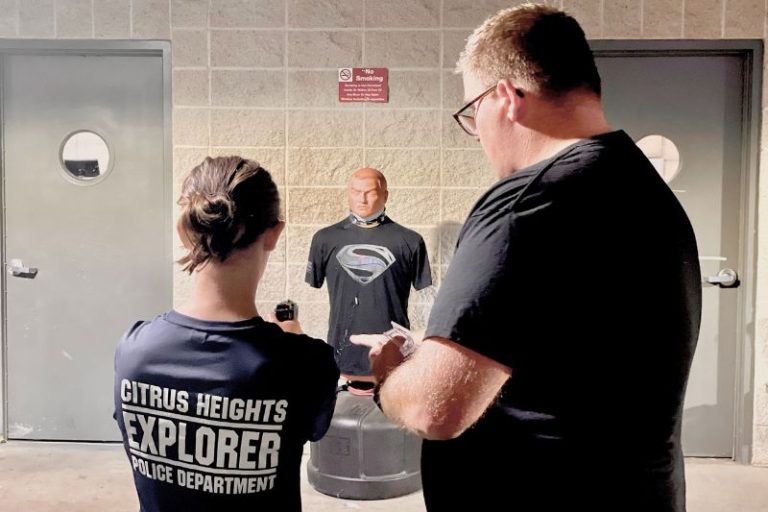 An Explorer in the Citrus Heights Police Explorer Program practicing using a fire arm. // CHPD