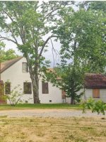 A boarded up home on Watson Way and Mariposa Ave. is listed for sale.