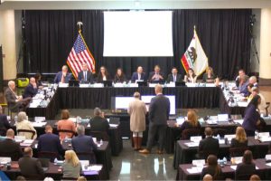 20 elected officials gathered together at the Sacramento Public Library for a meeting to discuss how to approach and improve homelessness and behavioral health in Sacramento County. Oct. 28, 2025. // SB Williams