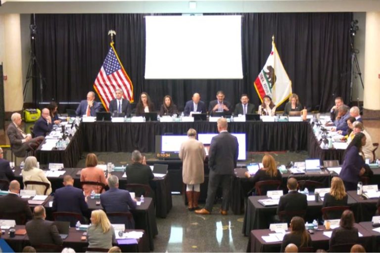 20 elected officials gathered together at the Sacramento Public Library for a meeting to discuss how to approach and improve homelessness and behavioral health in Sacramento County. Oct. 28, 2025. // SB Williams