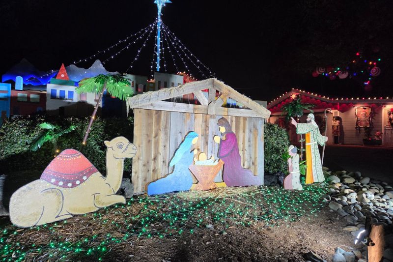 A home decorated with Christmas lights and a nativity scene on Farmgate Way in Citrus Heights // Luke Otterstad