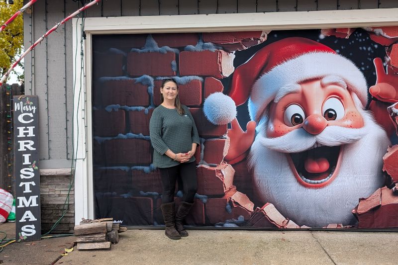 Kelley Winters stands in front of her home on Karen Rae Court. // SB Williams