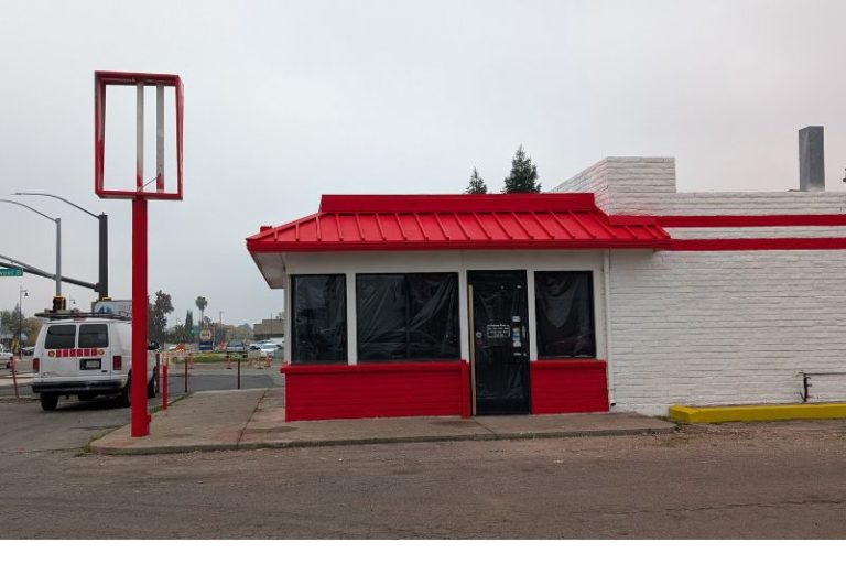The former home to Teriyaki Land has been repainted bright red and white. Dec. 5, 2025.