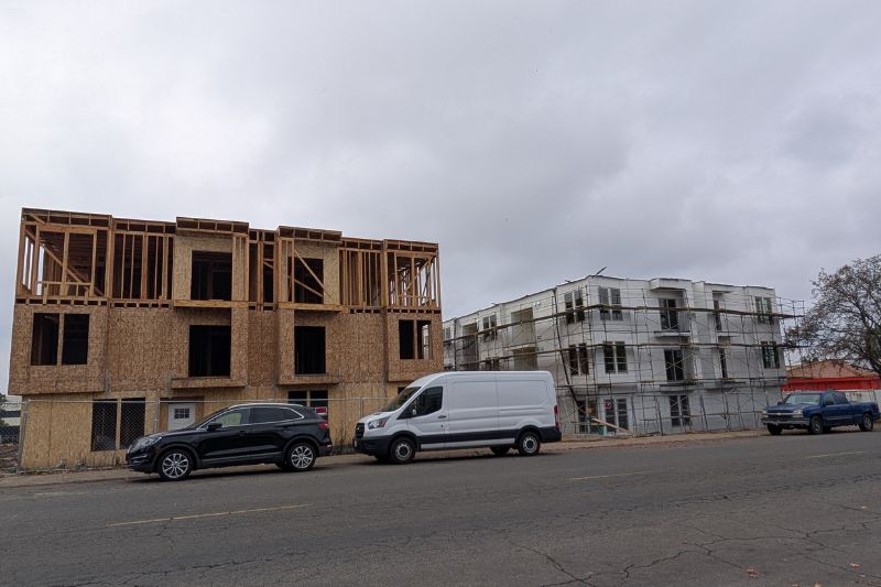 Two buildings cam be seen framed at the site of the future Sunrise Vista Apartments. 
