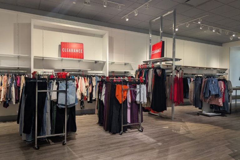 A clothing store has all its merchandise marked down in a clearance sale as it prepares to close its doors this January inside Sunrise Mall. // SB Williams