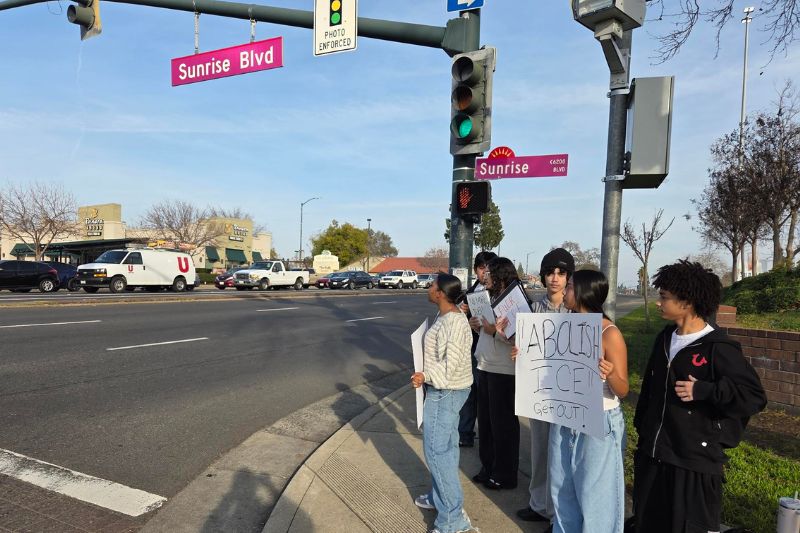 Eight students who said they were from Casa Roble High School were observed standing on the corner of Sunrise Boulevard and Greenback Lane with protest signs on Friday, Jan. 30. // CH Sentinel