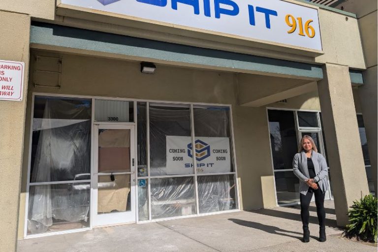 New business owner Abby Hernandez stands in front of Ship It 916, a shipping store expected to open next month in Citrus Heights. // SB Williams