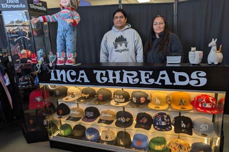 Family owners Antonio and Patricia Reynoso stand in their brick and mortar embroidery shop, Inca Threads. // SB Williams