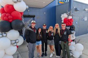 Owner Steve Grubbs (middle), Regional Manager Ryan Rafferty, (left) stand with Dutch Bros employees on opening day of the new Auburn Blvd. "Fireside" Dutch Bros location, March 2, 2026. // SB Williams