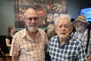 100-year-old Ted Mitchell stands with Citrus Heights Historical Society President Larry Fritz during Mitchell's 100th birthday celebration. March 15, 2026. // Courtesy of Larry Fritz
