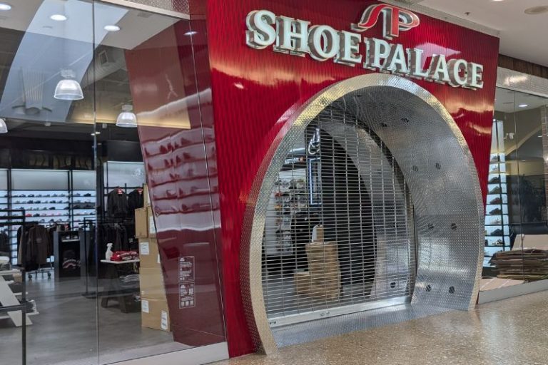 Employees could be seen moving merchandise amid a stack of boxes inside another store closing at Sunrise Mall, Saturday, April 25, 2026. // SB Williams