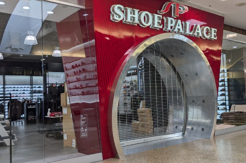 Employees could be seen moving merchandise amid a stack of boxes inside another store closing at Sunrise Mall, Saturday, April 25, 2026. // SB Williams