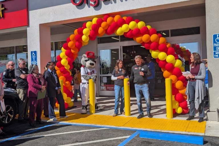 Grocery Outlet store owners Greg and Stephanie Ashworth stand with Citrus Heights Mayor and Vice Mayor, and members of Citrus Heights PAL, celebrating the grand opening their new Grocery Outlet location. Thursday, April 2, 2026. // SB Williams