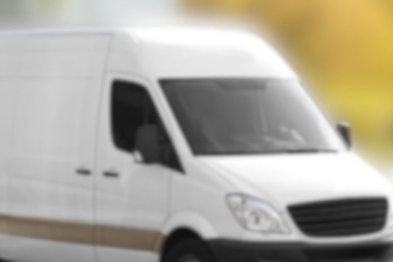 White coroner's van. Stock photo. // CH Sentinel