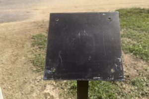 The stand that once held a Founders Plaque at C-Bar-C park is all that's left after the bronze plaque went missing April 24. // Courtesy of Michelle Knotts