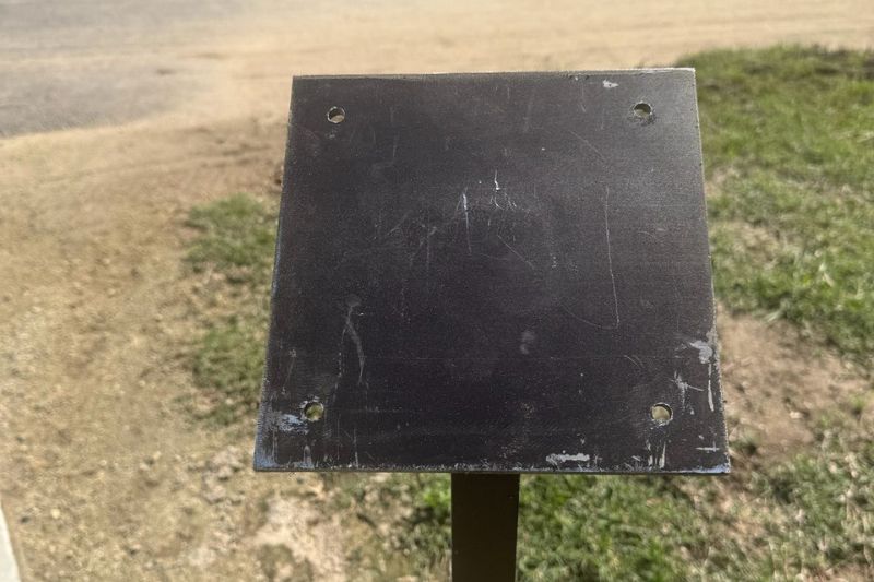 The stand that once held a Founders Plaque at C-Bar-C park is all that's left after the bronze plaque went missing April 24. // Courtesy of Michelle Knotts