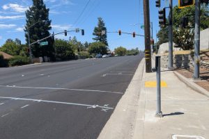Antelope Rd. and Amsterdam Ave.: Construction crews have painted temporary lane markings on Antelope Rd. while the final layer of resurfacing cures. // SB Williams