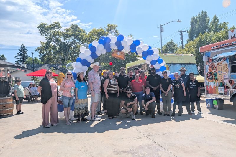 City officials and Citrus Heights Chamber of Commerce representatives gathered with multiple food truck vendor owners for a ribbon cutting Saturday morning to celebrate the Citrus Heights Food Truck Plaza's official grand opening. Aug. 8, 2026. // SB Williams