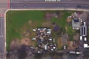 An aerial image shows multiple vehicles of varying types stored on a property on Antelope Rd. and Lauppel Ln. // SB Williams