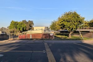 A vehicle crashed into a fence at the corner of Grand Oaks Blvd. and Rossewood, Sept. 22, 2026. // SB Williams