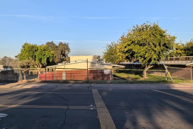 A vehicle crashed into a fence at the corner of Grand Oaks Blvd. and Rossewood, Sept. 22, 2026. // SB Williams