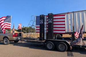 The MAGA Riders constructed a model of the Twin Towers with the word REMEMBER attached vertically, in honor of the memory of those lost on 9/11, prior to their weekly patriotic vehicle train. Sept. 11, 2026.